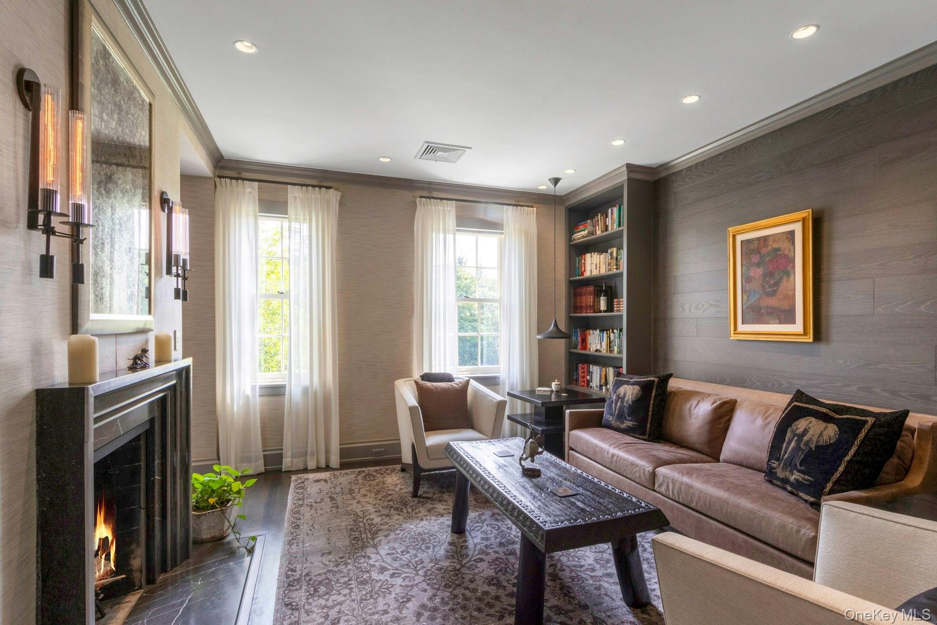 120 Ridge Road Tuxedo Park, NY 10987 - Photo 26 of 50 a living room with furniture a fireplace and a window