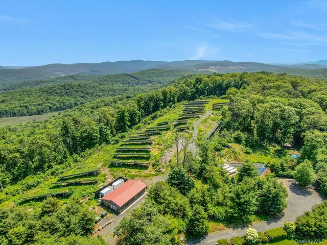 a view of a hallway with stairs