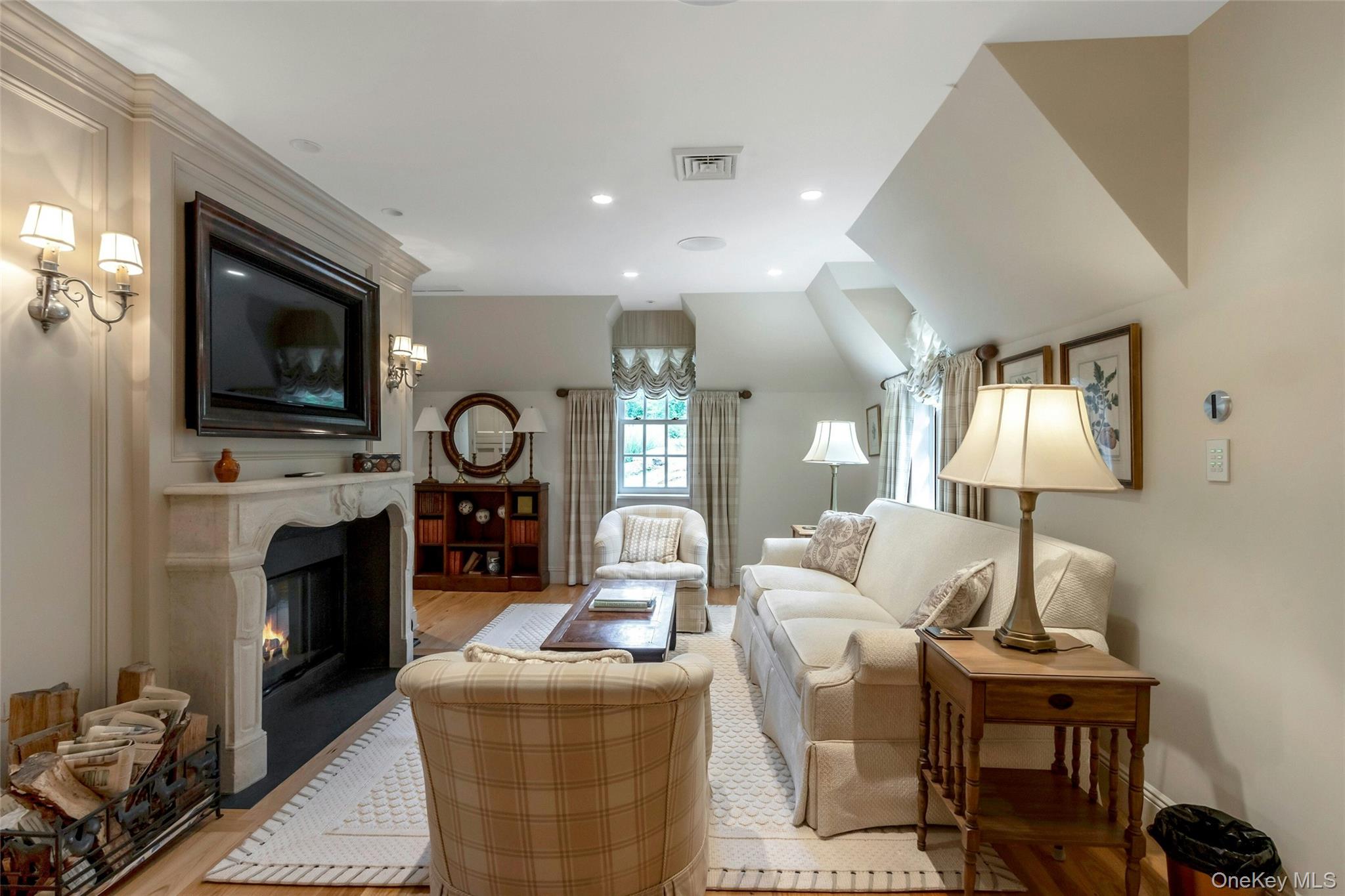 120 Ridge Road Tuxedo Park, NY 10987 - Photo 48 of 50 a living room with fireplace furniture and a flat screen tv