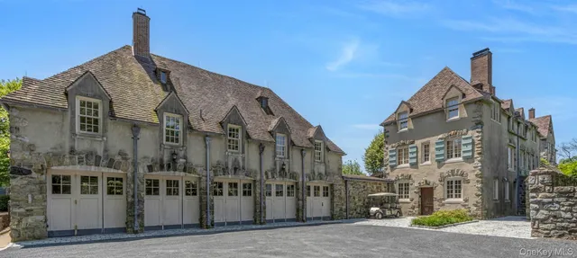 a view of a lush green hillside and a houses