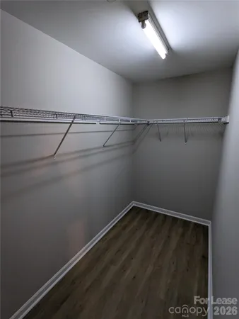 a view of a room with racks on the wall