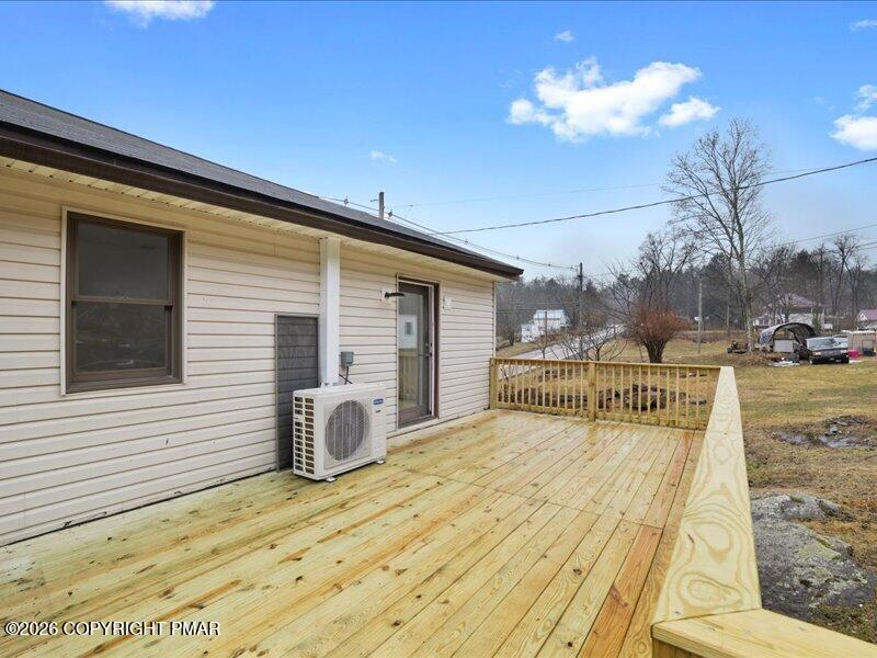 689 Main Road Hunlock Creek, PA 18621 - Photo 11 of 38 a view of a chair and tables in the patio