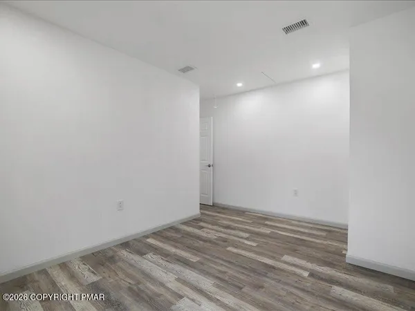 a view of staircase with white walls and white walls
