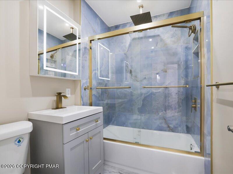 689 Main Road Hunlock Creek, PA 18621 - Photo 20 of 38 a bathroom with a sink a toilet and a bathtub