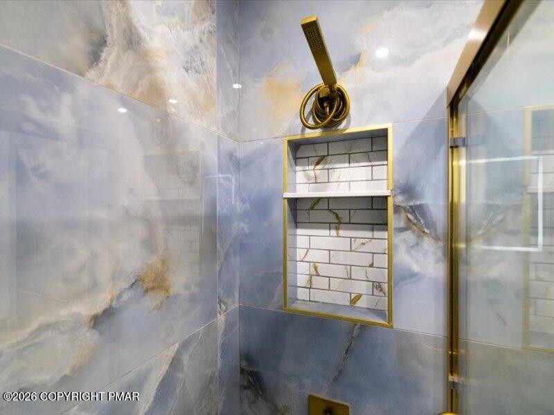 689 Main Road Hunlock Creek, PA 18621 - Photo 22 of 38 a bathroom with a window and a shower