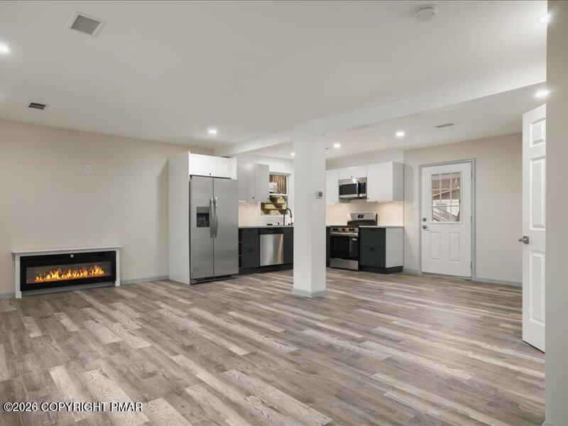 689 Main Road Hunlock Creek, PA 18621 - Photo 27 of 38 a view of a kitchen with a sink cabinets and a refrigerator