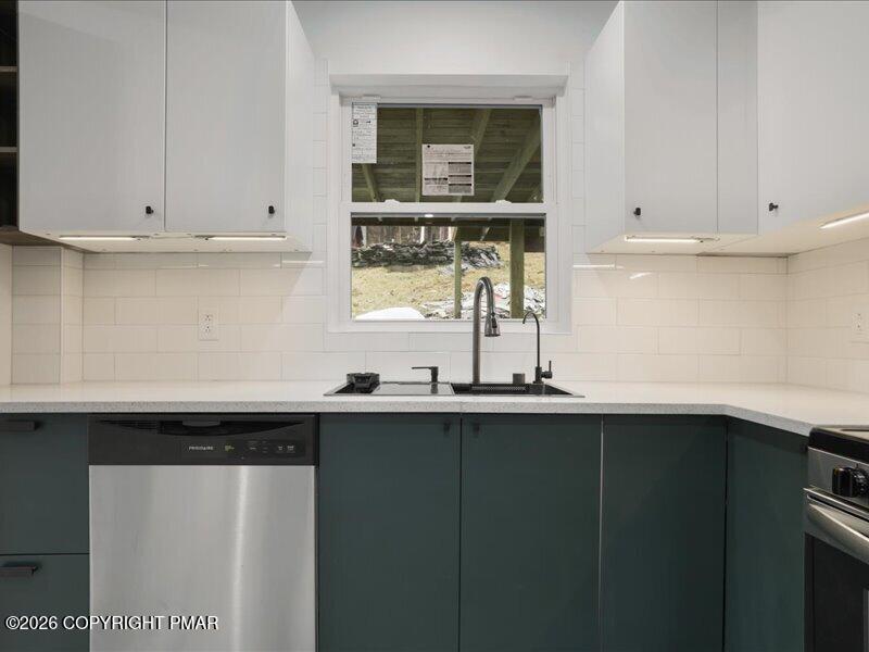 689 Main Road Hunlock Creek, PA 18621 - Photo 32 of 38 a kitchen with a sink and cabinets