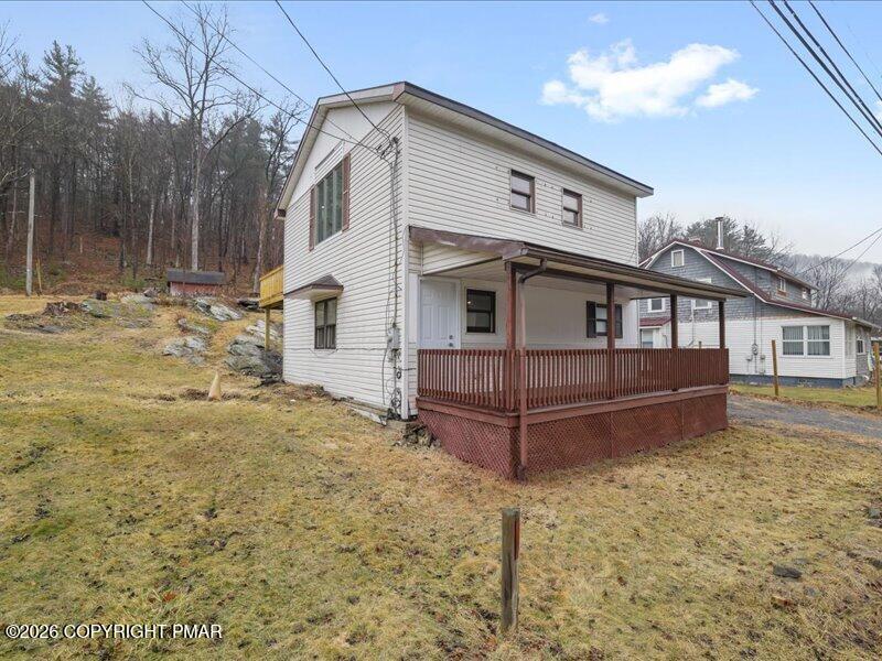 689 Main Road Hunlock Creek, PA 18621 - Photo 4 of 38 a view of a house with wooden fence