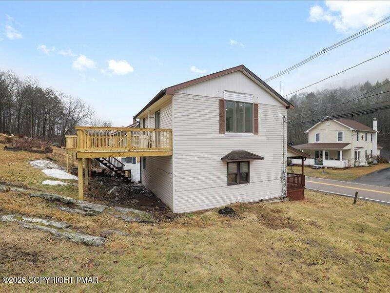 689 Main Road Hunlock Creek, PA 18621 - Photo 7 of 38 a view of a house with a yard