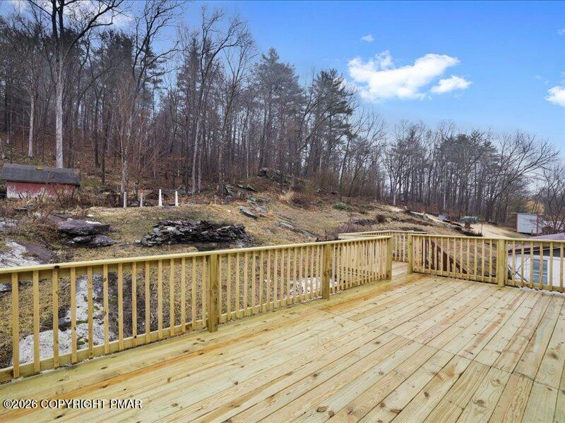 689 Main Road Hunlock Creek, PA 18621 - Photo 10 of 38 a view of balcony with wooden floor and fence