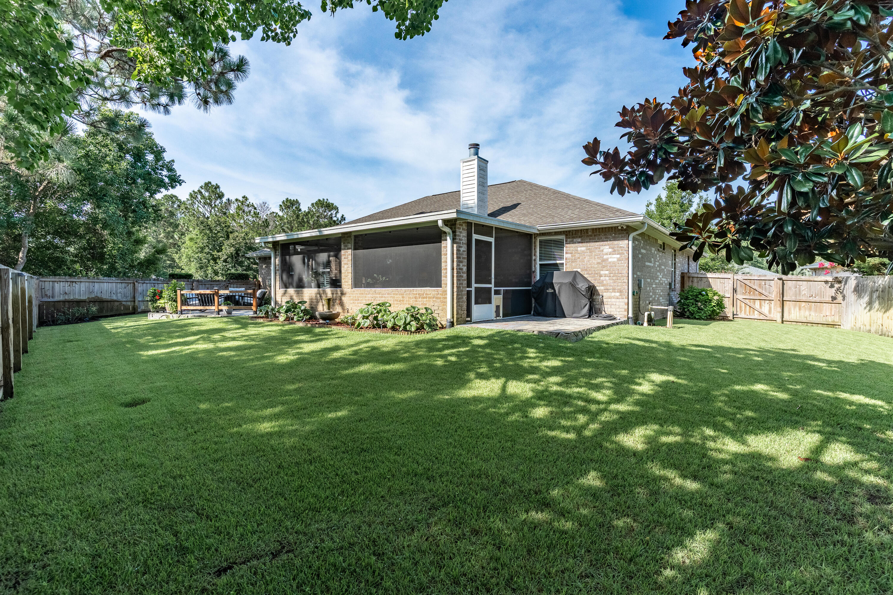 2300 Valley Place Navarre, FL 32566 - Photo 68 of 81 a front view of house with yard and green space