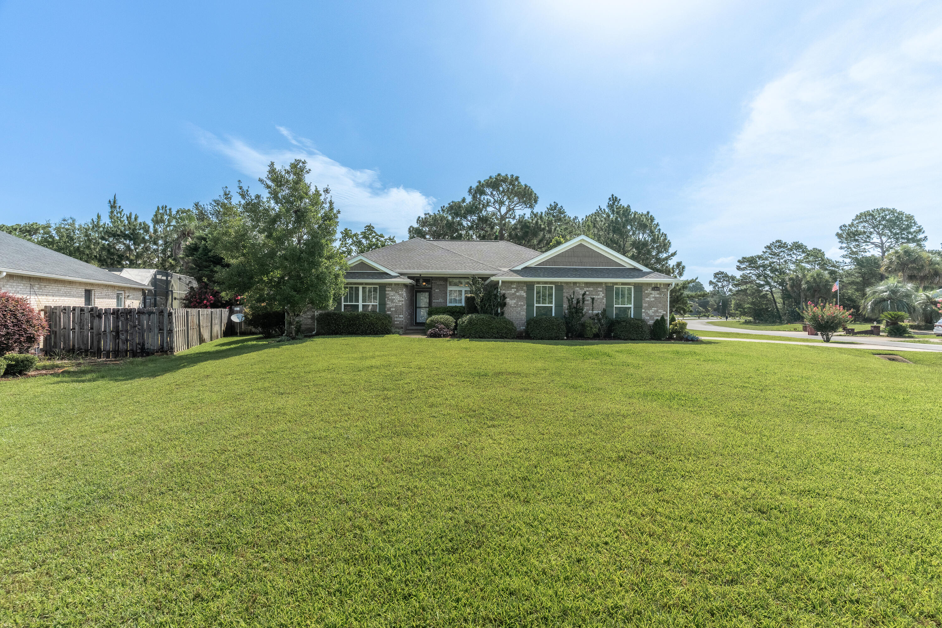 2300 Valley Place Navarre, FL 32566 - Photo 80 of 81 a front view of a house with a yard