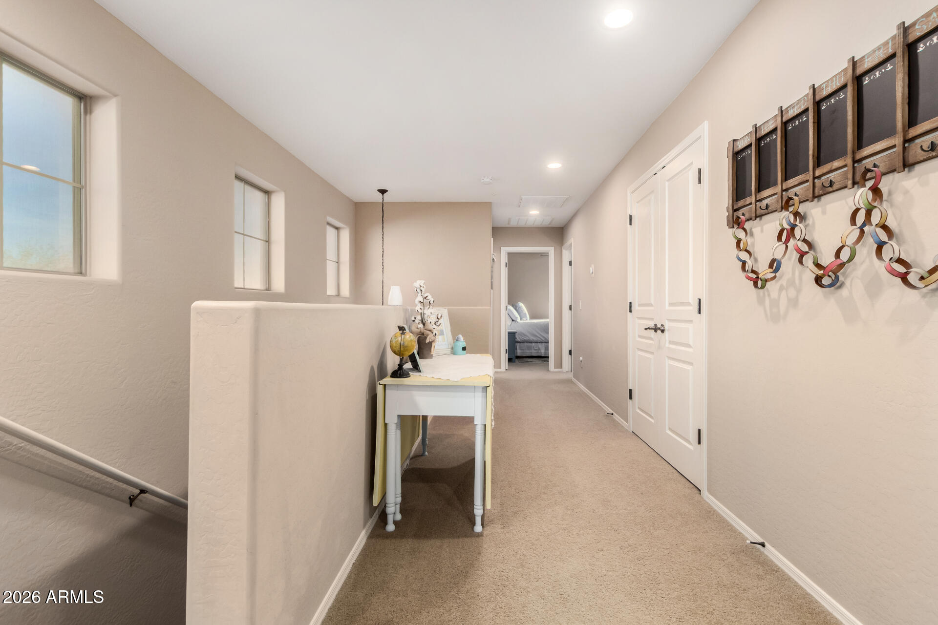 7316 West Montgomery Road Peoria, AZ 85383 - Photo 20 of 49 a kitchen with refrigerator and white cabinets