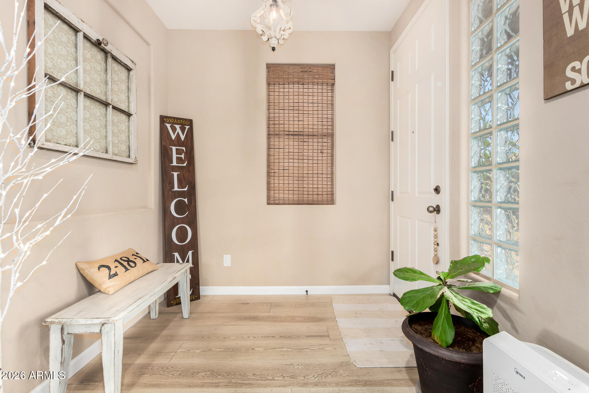 7316 West Montgomery Road Peoria, AZ 85383 - Photo 3 of 49 a white bath tub sitting in a bathroom next to a window