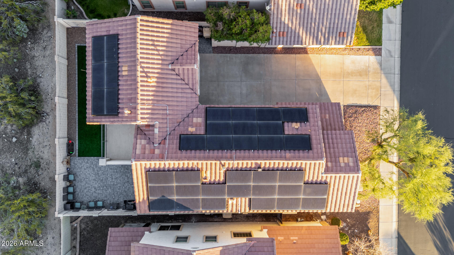 7316 West Montgomery Road Peoria, AZ 85383 - Photo 40 of 49 a front view of a house with a yard