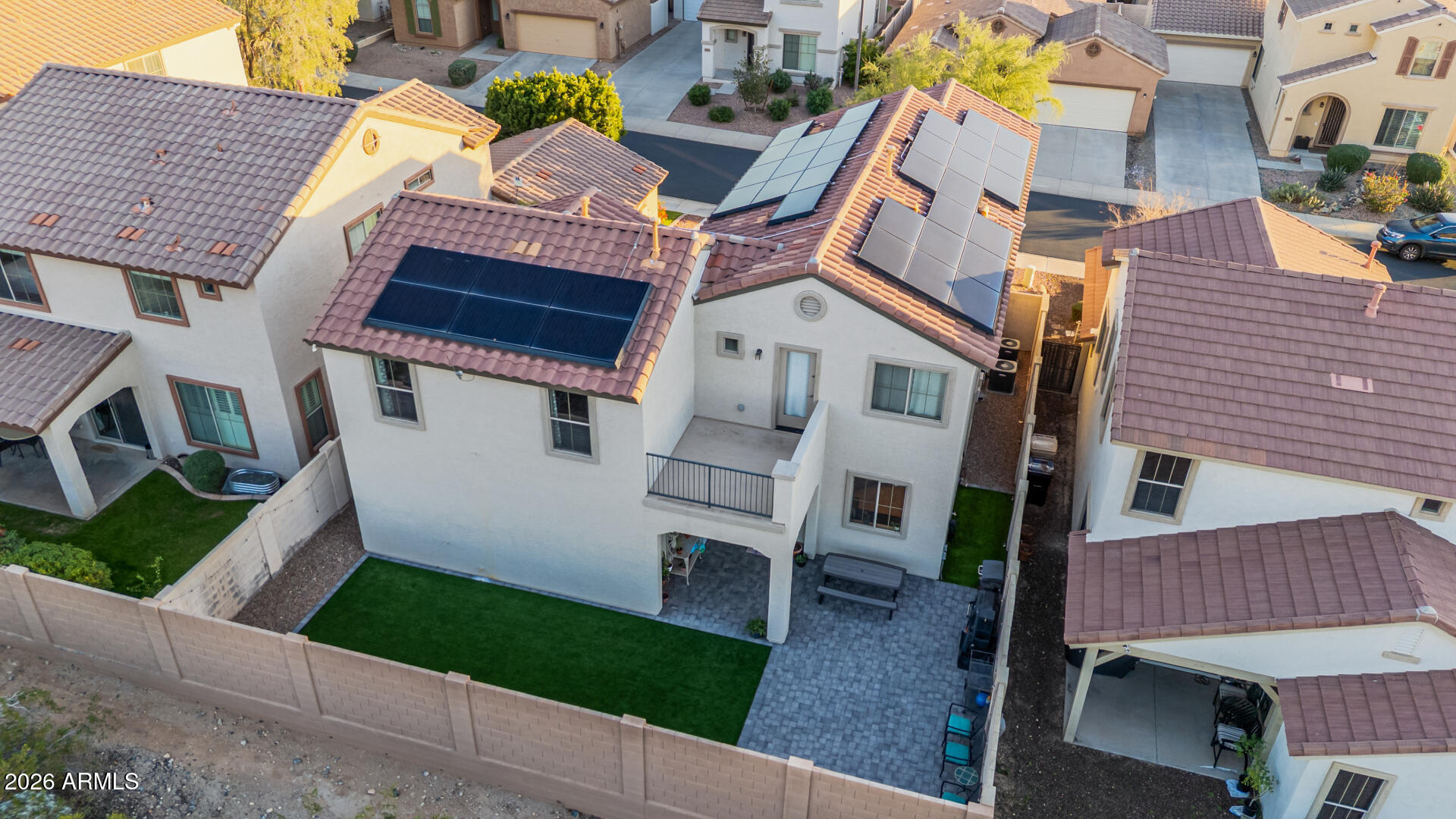 7316 West Montgomery Road Peoria, AZ 85383 - Photo 44 of 49 a view of a house with a yard