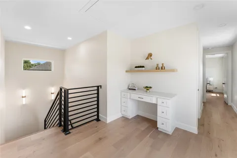 a bedroom with bed and a window