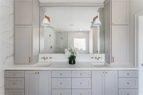 a bathroom with a bathtub and shower