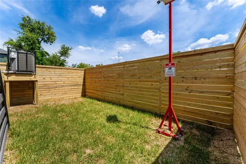 a view of a house with a large window