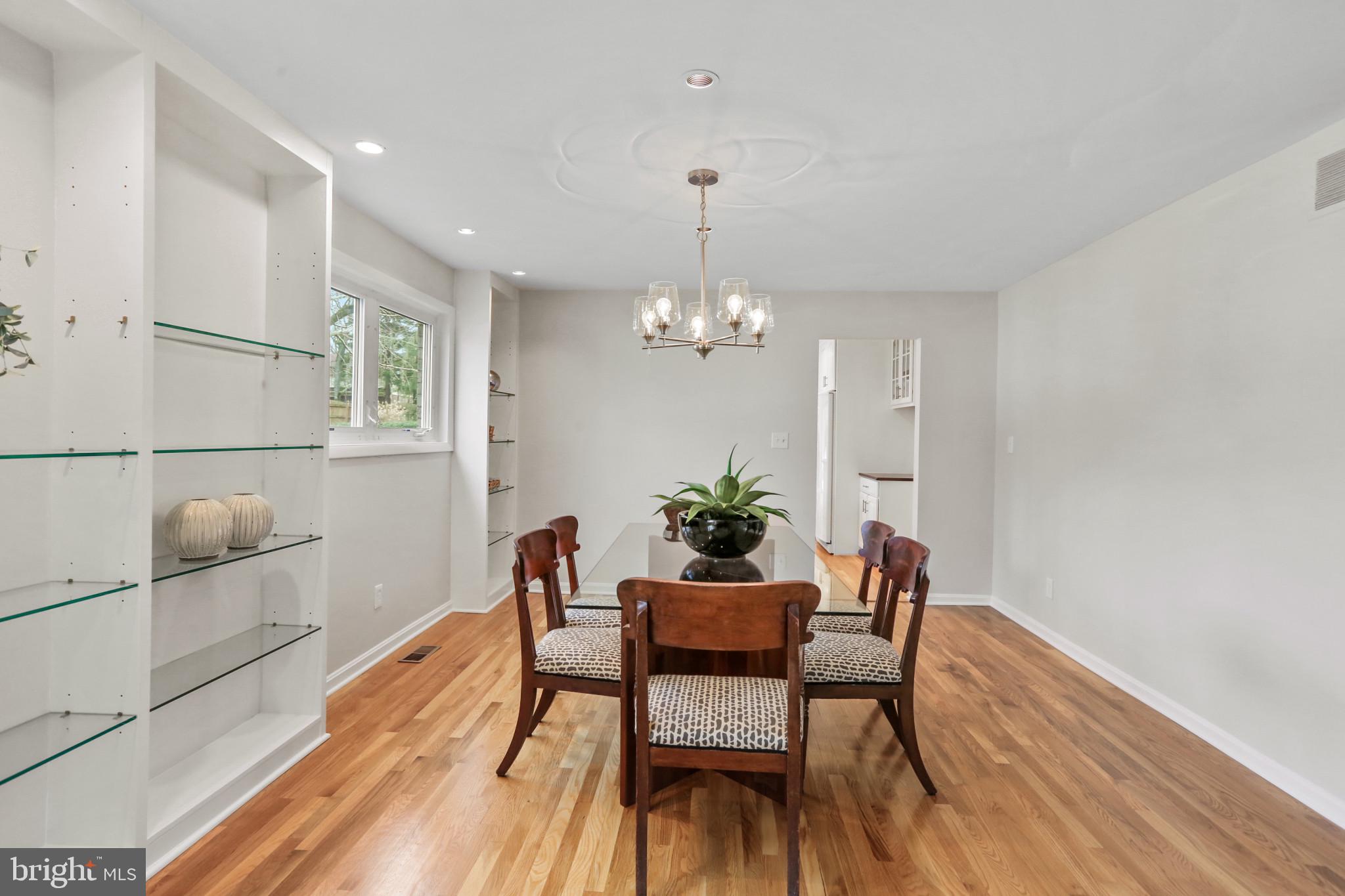 7207 Denberg Road Baltimore, MD 21209 - Photo 14 of 62 Dining room with built-in shelves