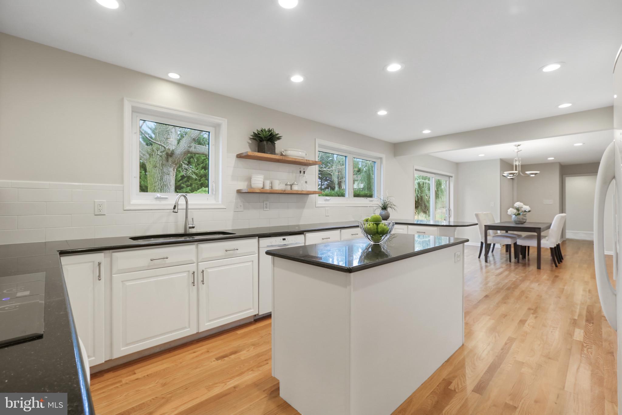 7207 Denberg Road Baltimore, MD 21209 - Photo 17 of 62 Newly installed hardwood floors