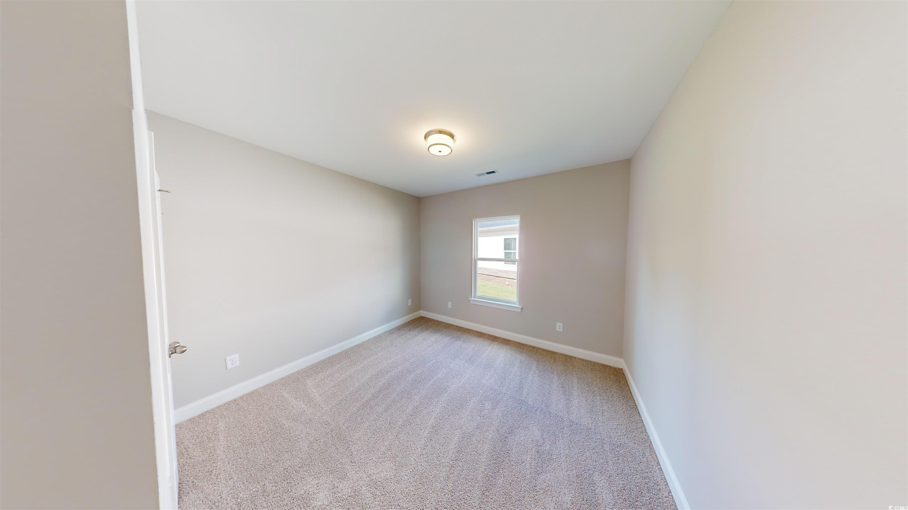 1016 Moen Loop, Unit LOT 5 Conway, SC 29526 - Photo 4 of 31 Empty room featuring light colored carpet