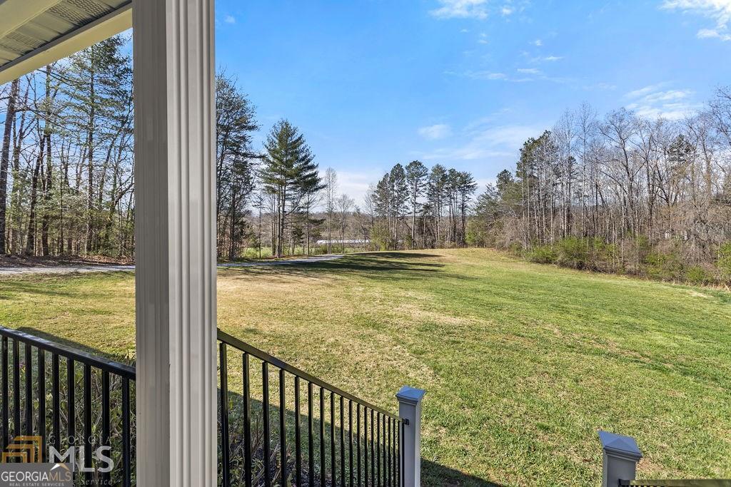 3077 Alec Mountain Road Clarkesville, GA 30523 - Photo 27 of 35 a view of a balcony with an ocean view