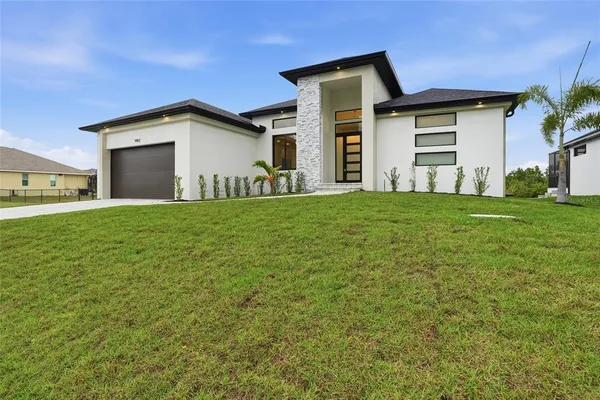 a house with yard in front of it