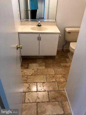 a bathroom with a sink and a toilet