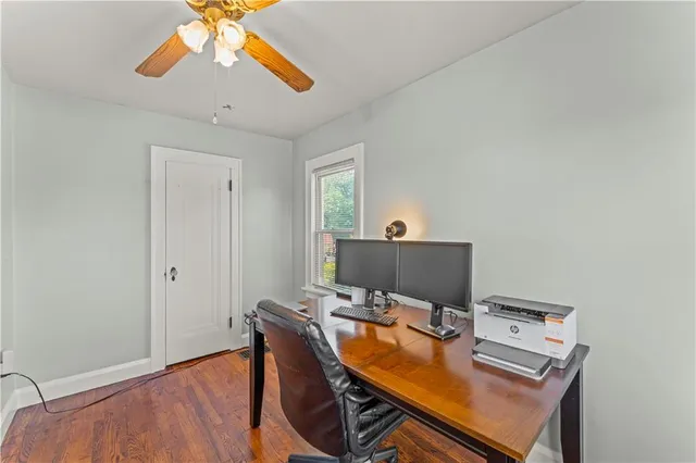 a workspace with furniture and window