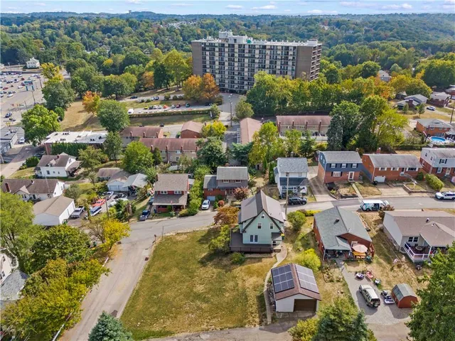 a picture of a bathroom with a shower