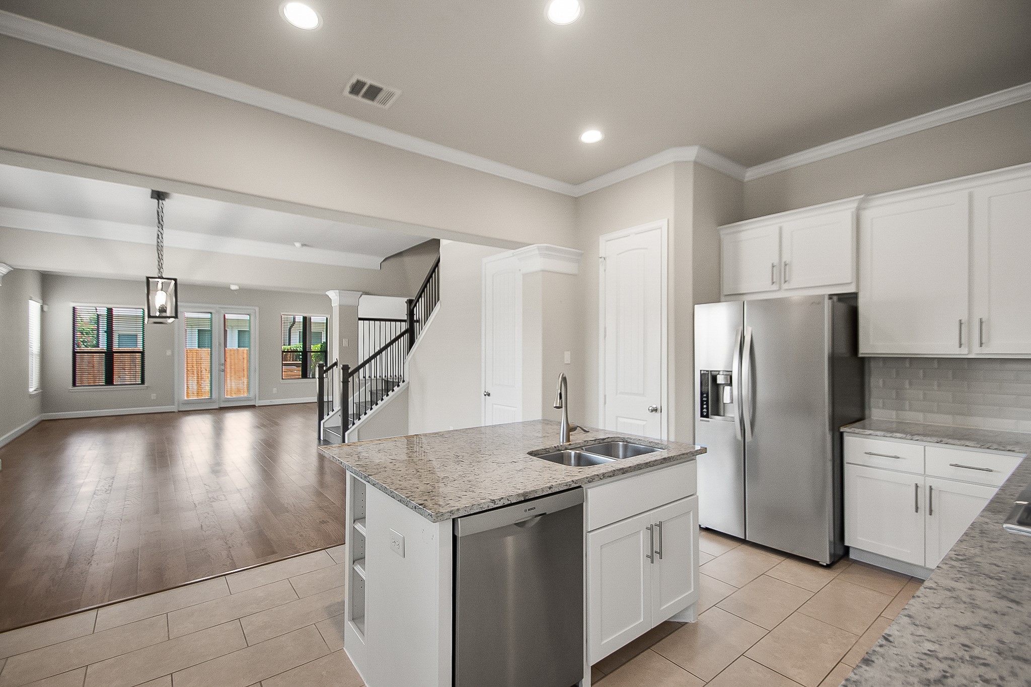 5328 Larkin Street Houston, TX 77007 - Photo 7 of 28 This open-concept layout enhances natural light and allows for effortless flow between indoor entertaining and outdoor living.