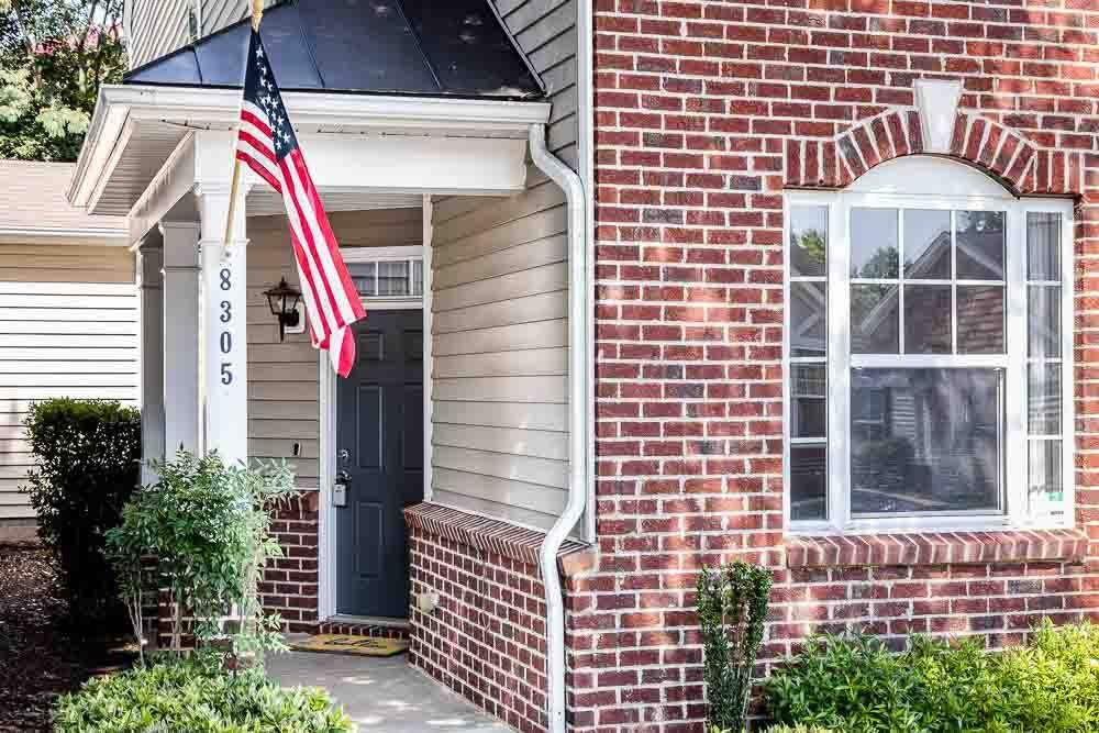 8305 Chimneycap Drive Raleigh, NC 27613 - Photo 2 of 30 Lovely brick accents on the front and a small courtyard that welcomes your gardening touch or hides your trash cans! Covered Entry