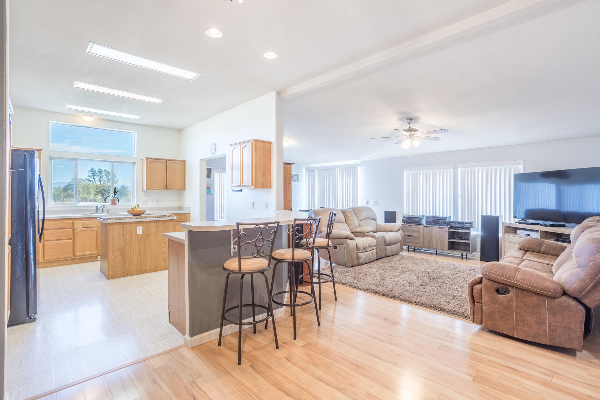 11541 Homestead Lane Redding, CA 96003 - Photo 12 of 51 a living room with furniture and a wooden floor