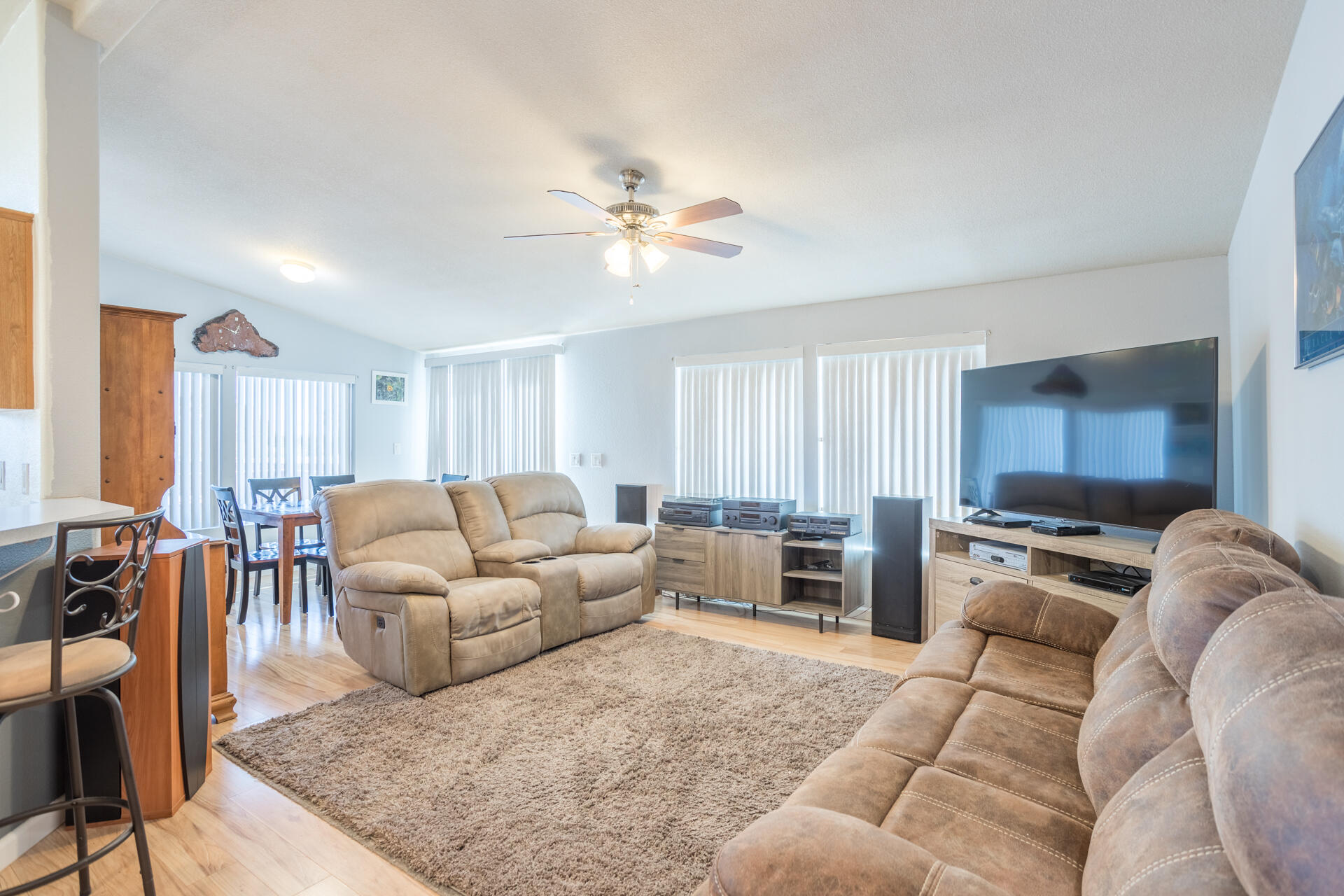 11541 Homestead Lane Redding, CA 96003 - Photo 14 of 51 a living room with furniture ceiling fan and a rug