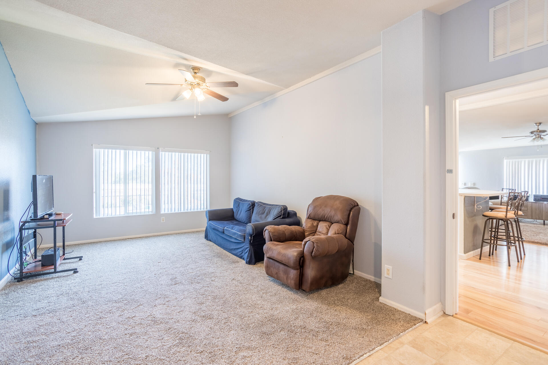 11541 Homestead Lane Redding, CA 96003 - Photo 21 of 51 a living room with furniture and a window