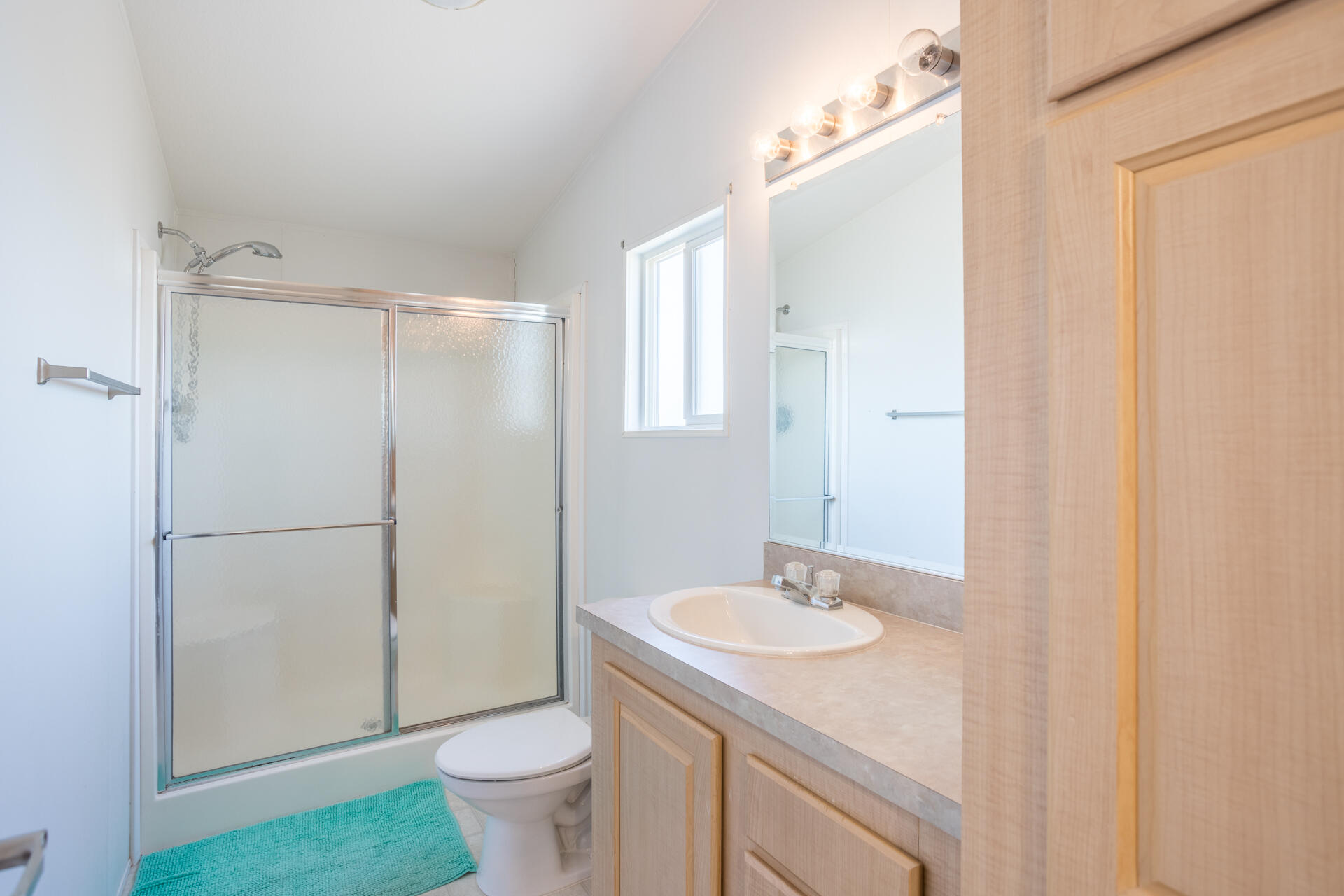 11541 Homestead Lane Redding, CA 96003 - Photo 22 of 51 a bathroom with a sink toilet and shower