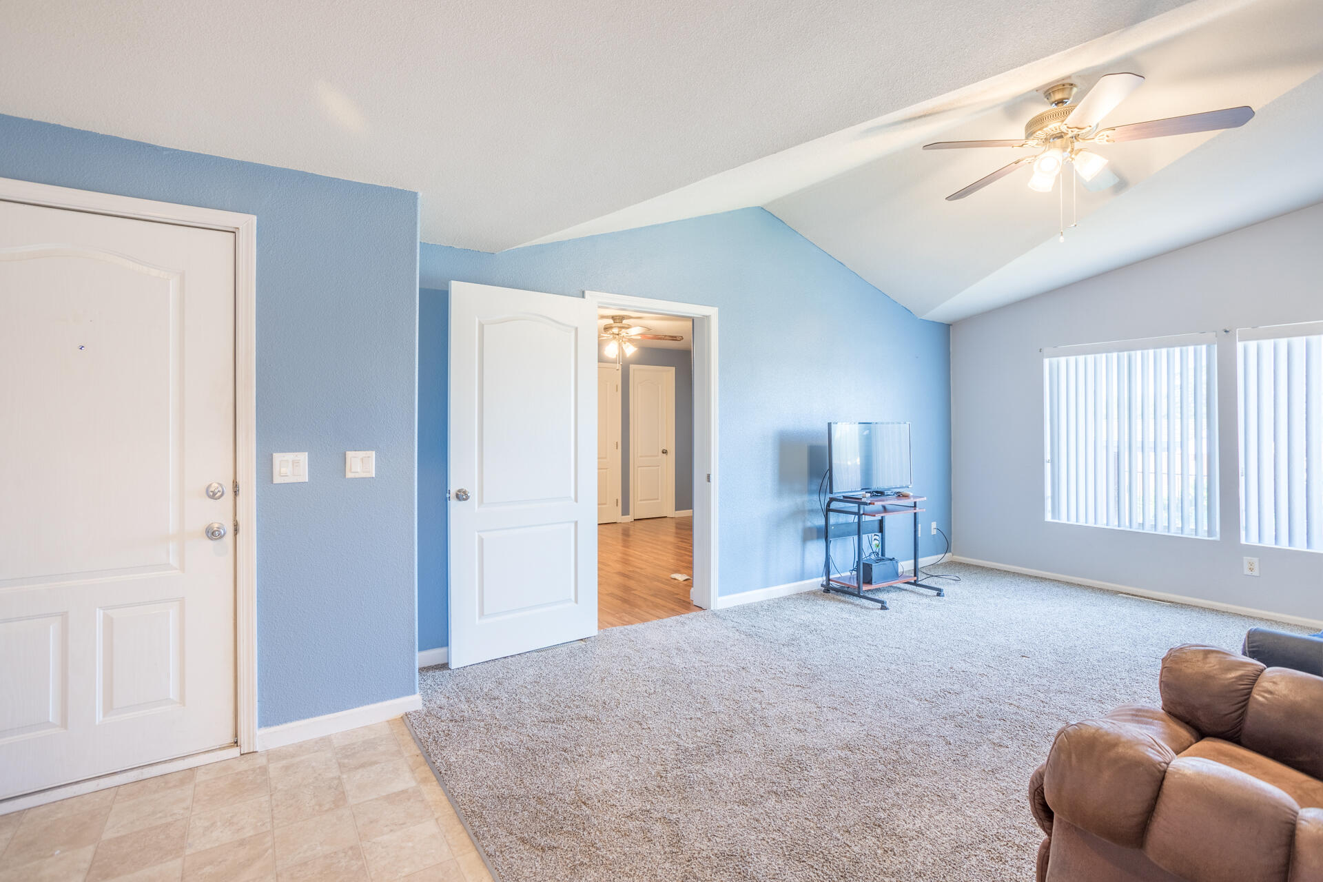 11541 Homestead Lane Redding, CA 96003 - Photo 24 of 51 a living room with furniture and a window