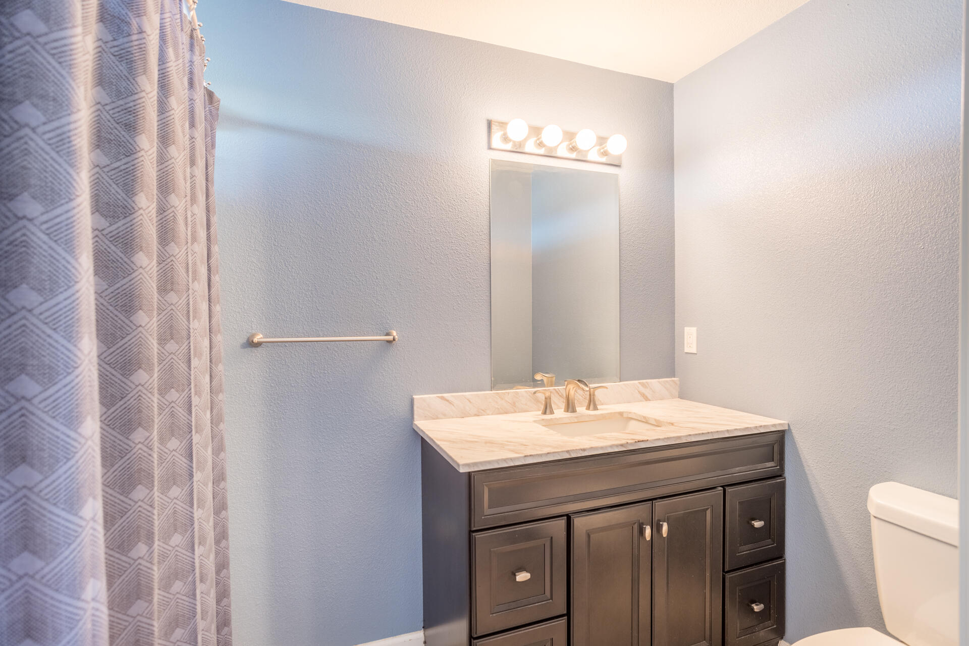 11541 Homestead Lane Redding, CA 96003 - Photo 25 of 51 a bathroom with a sink and a toilet