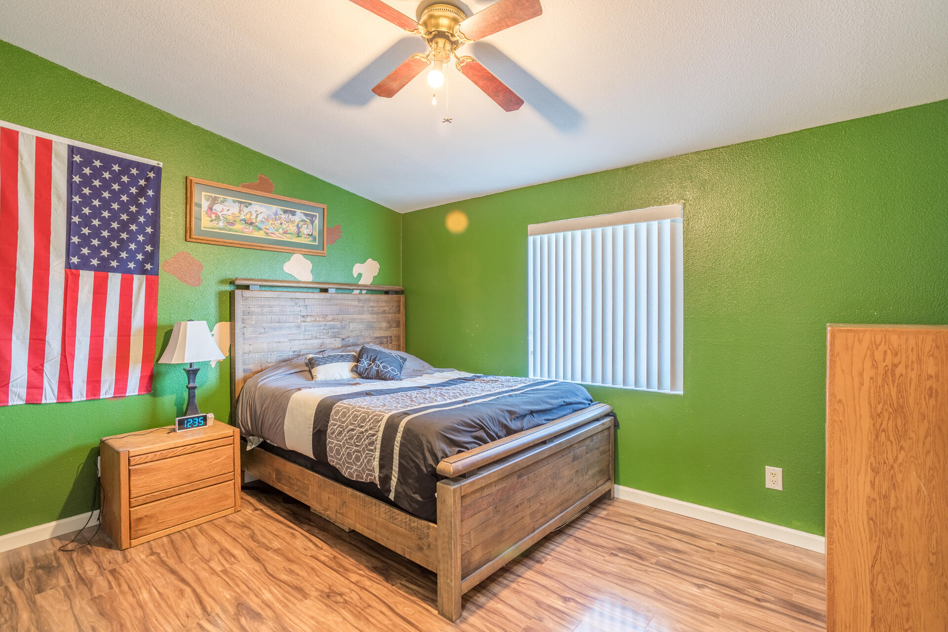 11541 Homestead Lane Redding, CA 96003 - Photo 33 of 51 a bed sitting in a spacious bedroom next to a window