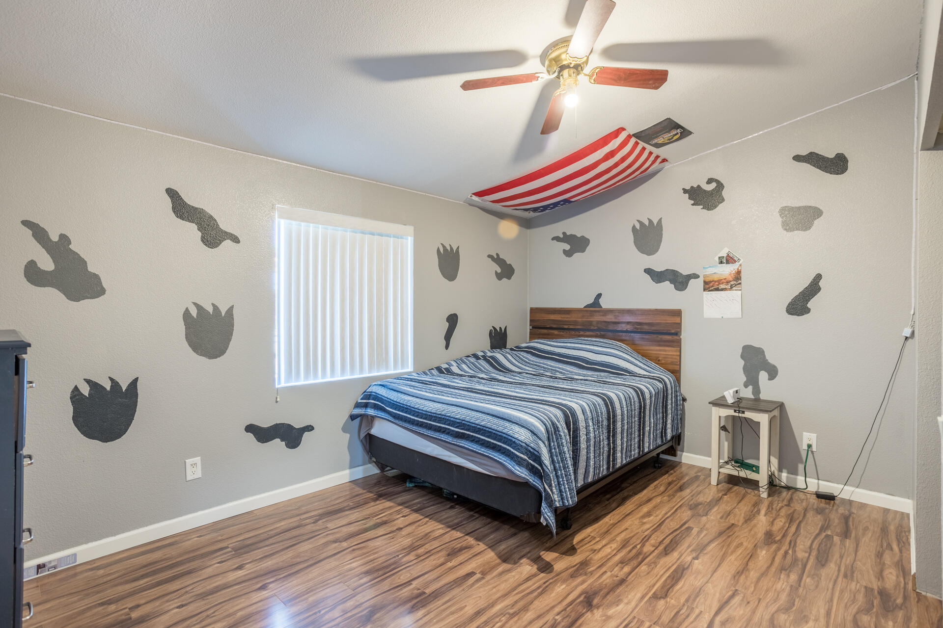 11541 Homestead Lane Redding, CA 96003 - Photo 35 of 51 a bedroom with a bed and a window