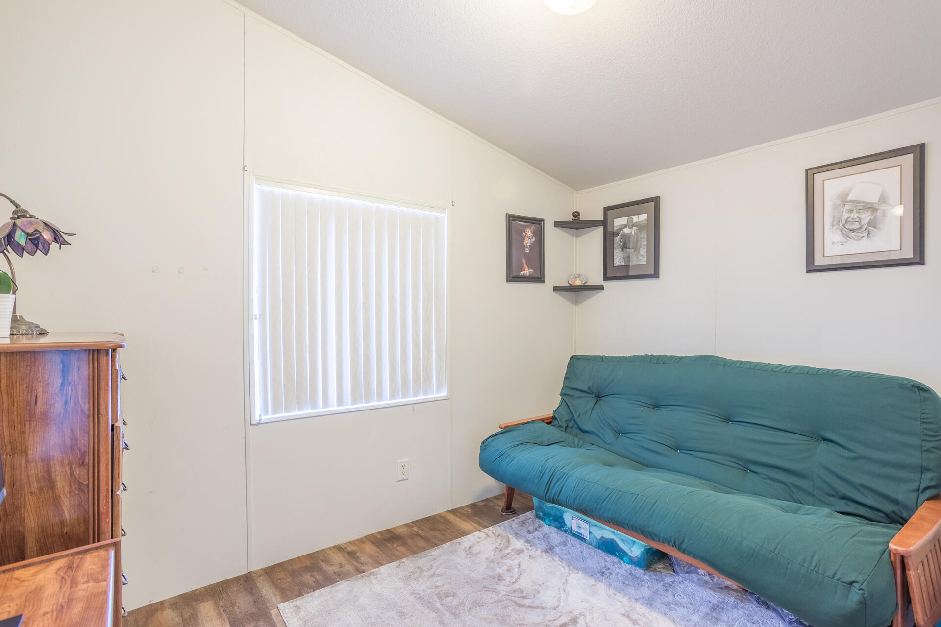 11541 Homestead Lane Redding, CA 96003 - Photo 36 of 51 a living room with furniture and a window