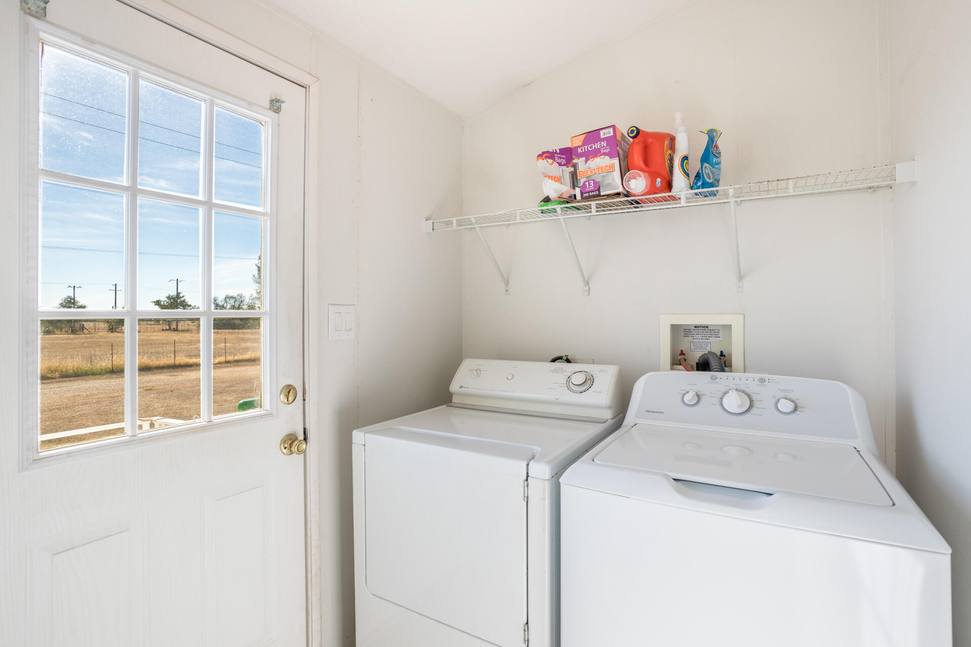 11541 Homestead Lane Redding, CA 96003 - Photo 37 of 51 a utility room with dryer and washer