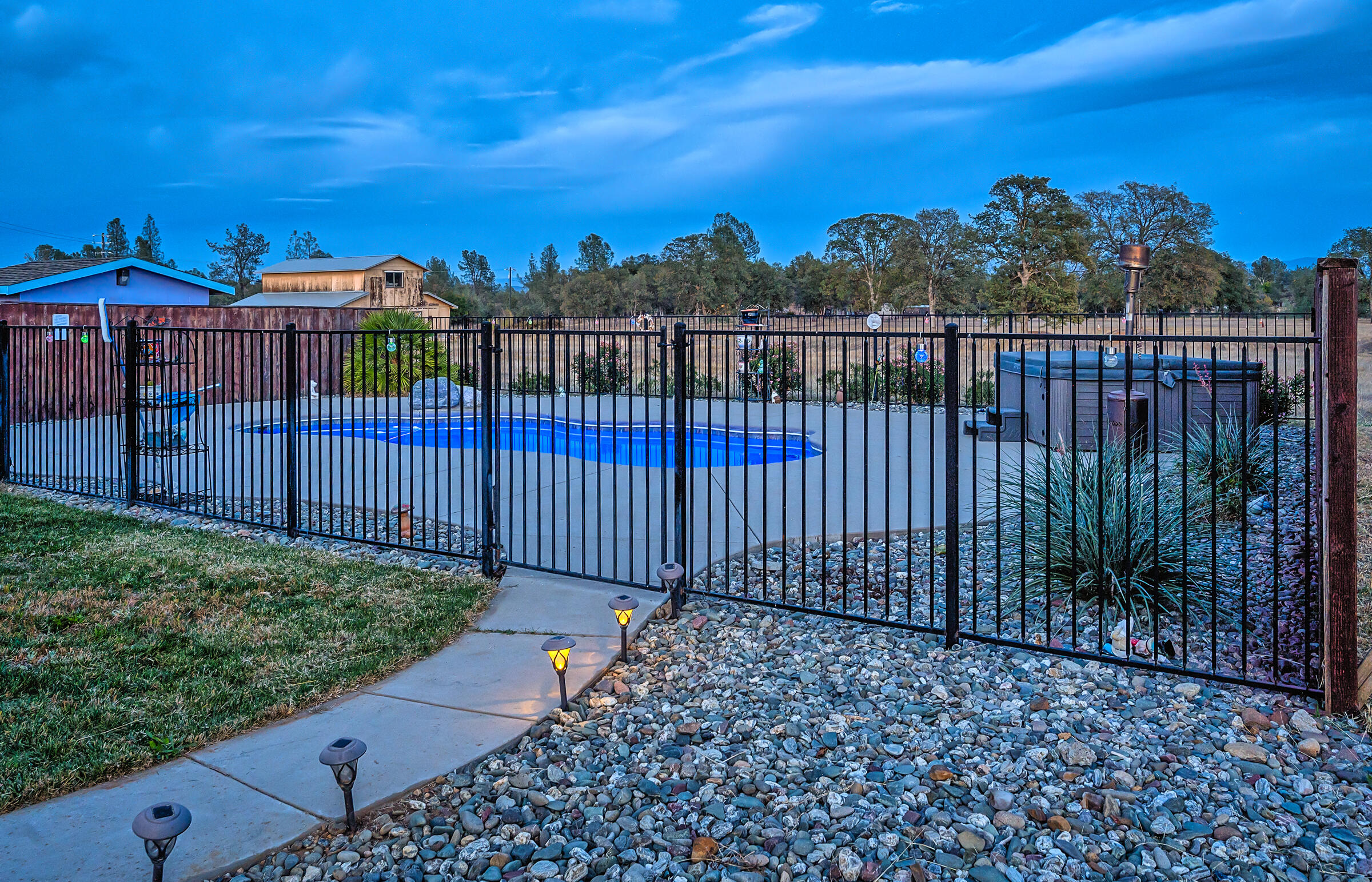 11541 Homestead Lane Redding, CA 96003 - Photo 47 of 51 a view of a wrought iron fences in front of house