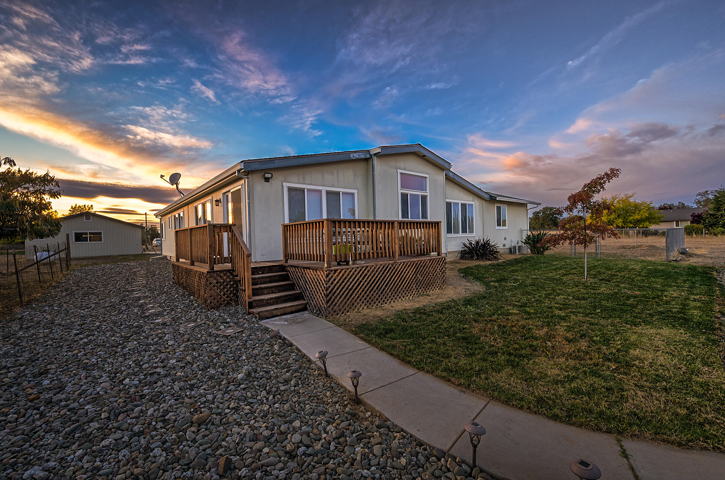11541 Homestead Lane Redding, CA 96003 - Photo 8 of 51 a front view of a house with garden
