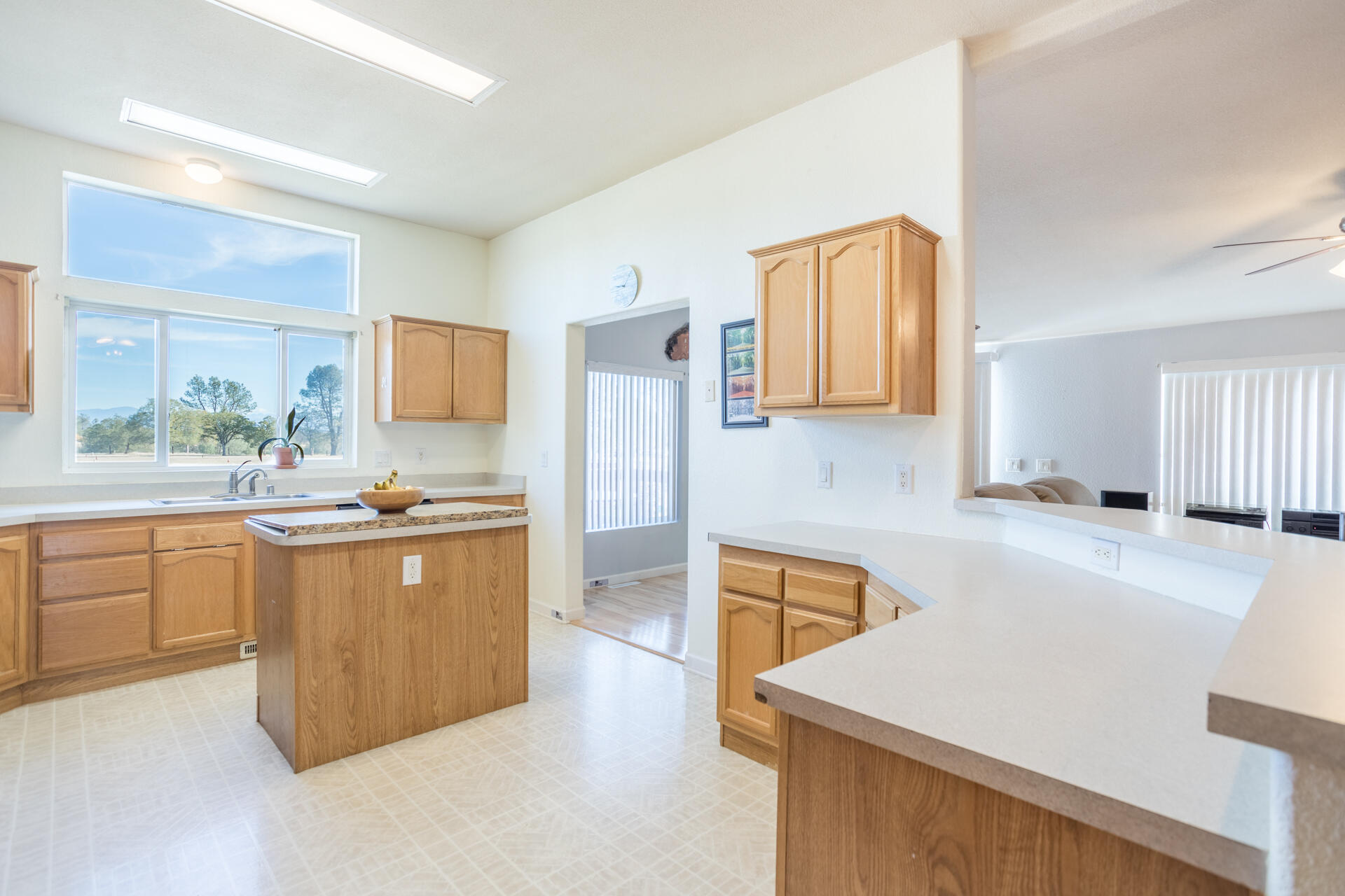 11541 Homestead Lane Redding, CA 96003 - Photo 10 of 51 a kitchen with stainless steel appliances granite countertop a sink dishwasher stove and refrigerator