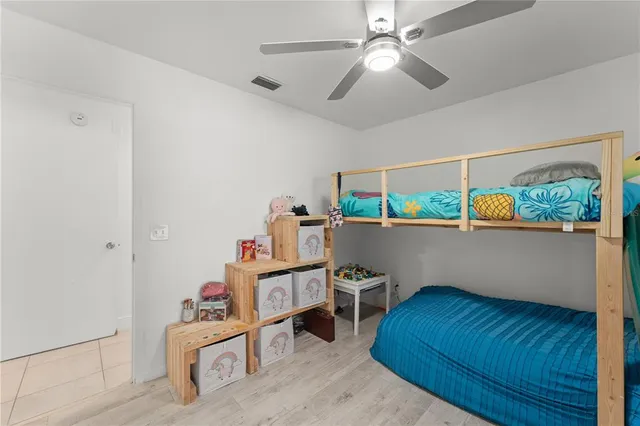 a room with furniture and a wooden floor