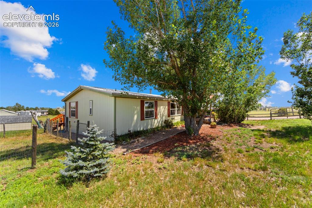 6245 Peerless Farms Road Peyton, CO 80831 - Photo 3 of 42