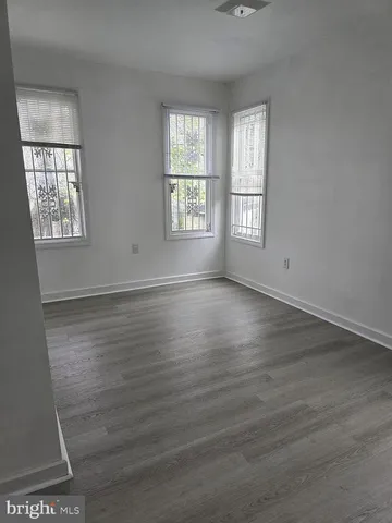 a bathroom with a bathtub and a sink