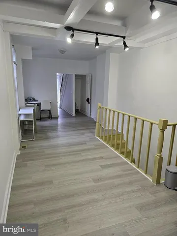 a kitchen with stainless steel appliances granite countertop a stove and a refrigerator